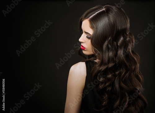 Beautiful woman, glamour portrait on dark background 