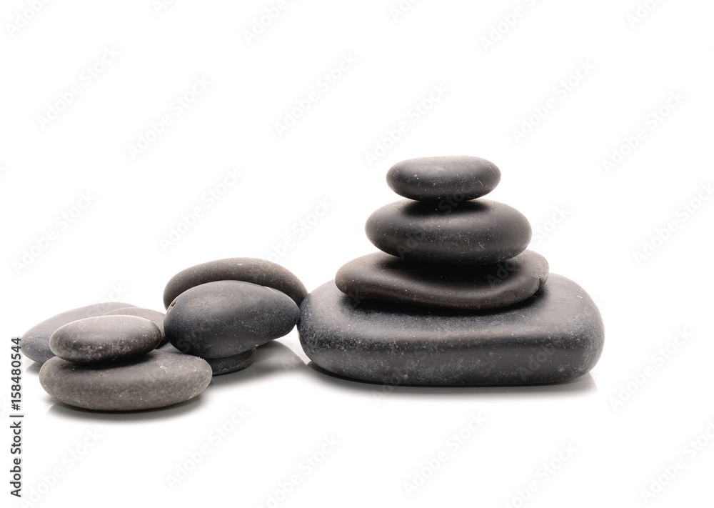 Fototapeta premium Stacked stones isolated on white