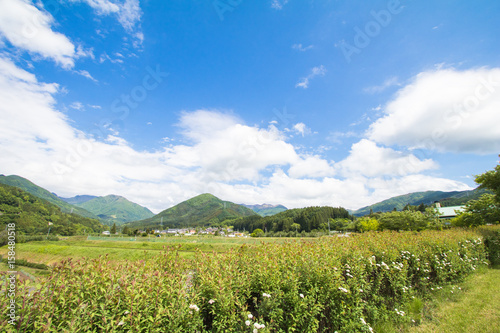 Beautiful landscape of Takayama mura at sunny summer or spring day and blue sky in Kamitakai District in northeast Nagano Prefecture Japan.
