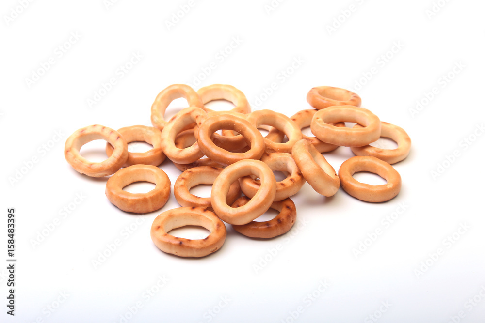 Salty Mini Pretzels with Salt in a Bowl, small bagel - homemade organic snack for beer isolated white background Salty Mini Pretzels with Salt in a Bowl, small bagel - homemade organic snack for beer isolated white background