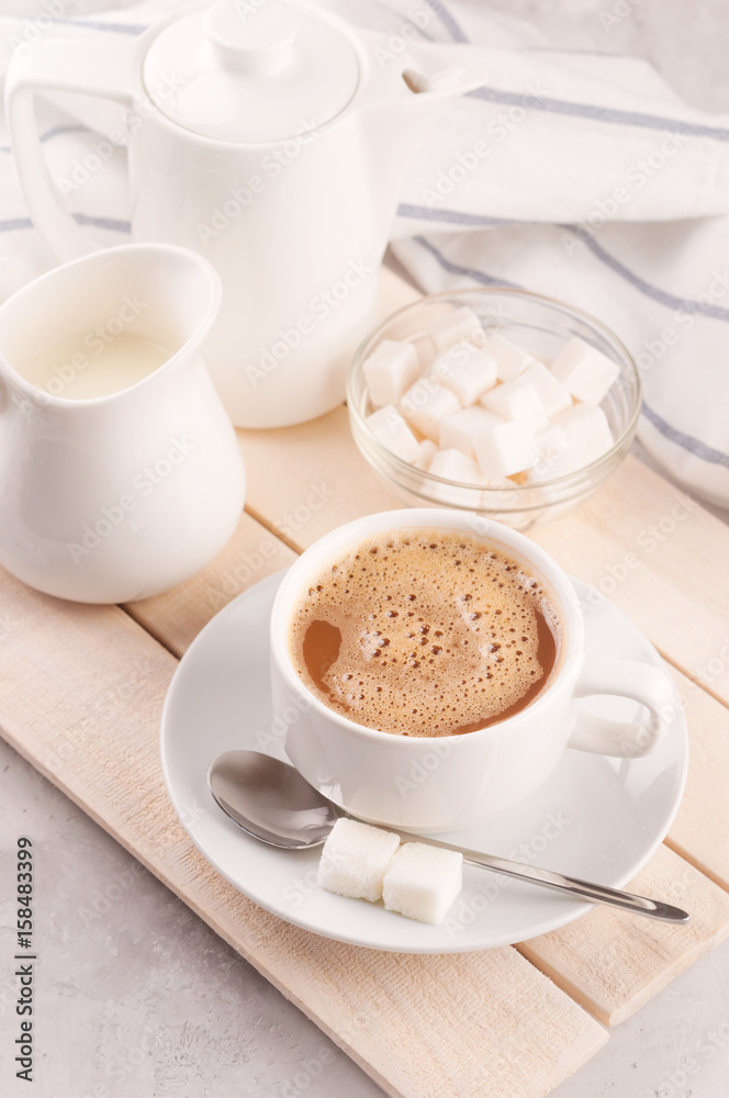 Breakfast, Cup with coffee and milk on a white concrete background Sunlight Breakfast, Cup with coffee and milk on a white concrete background Sunlight
