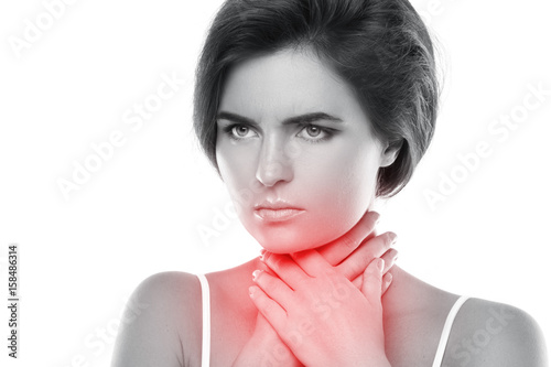 Woman with a pain in her throat
