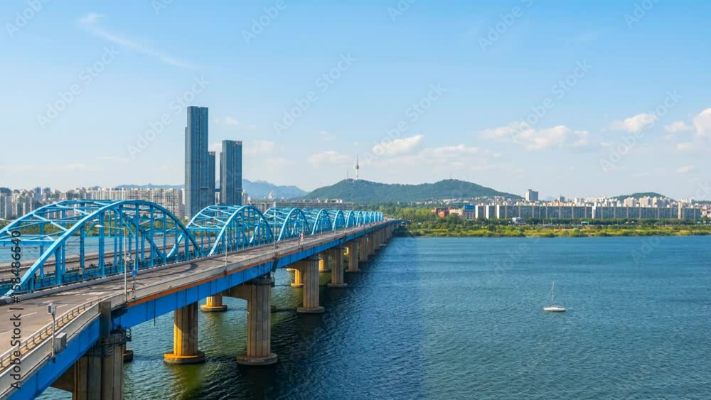 Time lapse of Seoul City skyline at Dongjak Bridge and Han river in Seoul, South Korea.