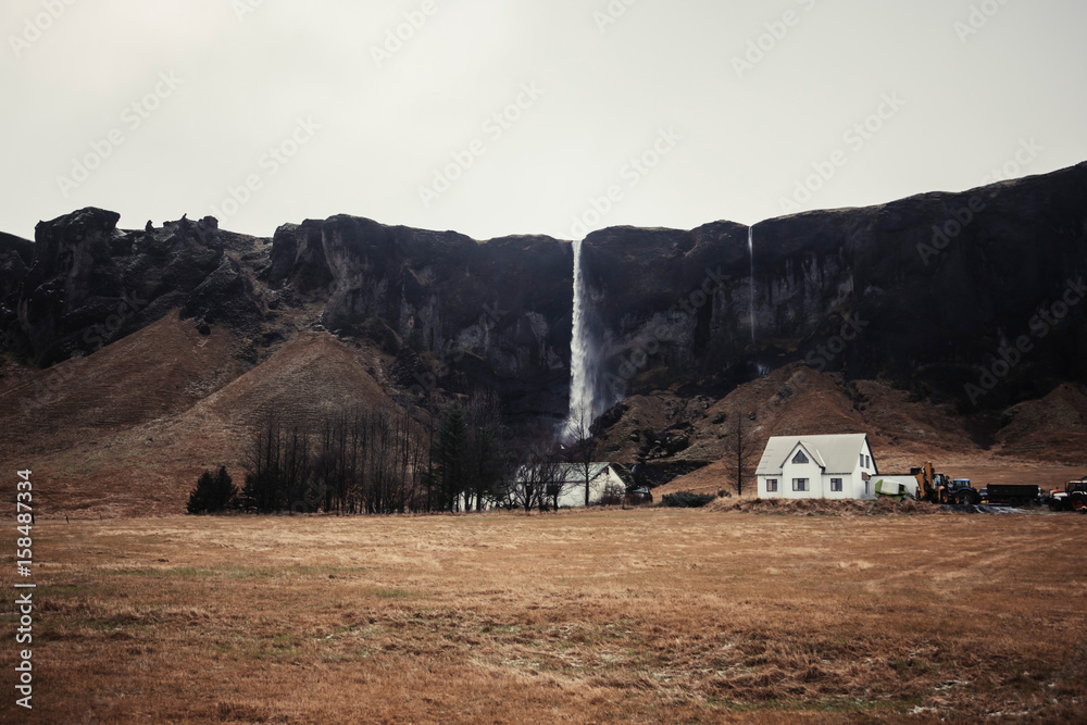 Little settlement by the waterfall in Iceland