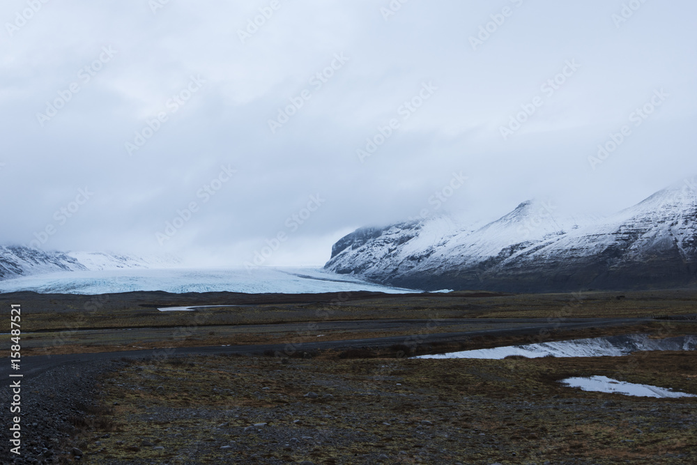 Dark view on Vatnajokull glacier in winter Iceland 