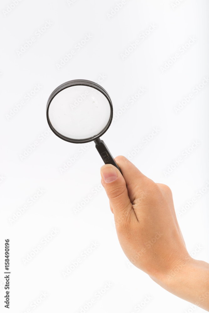 Female hands on white background with magnifier Female hands on white background with magnifier