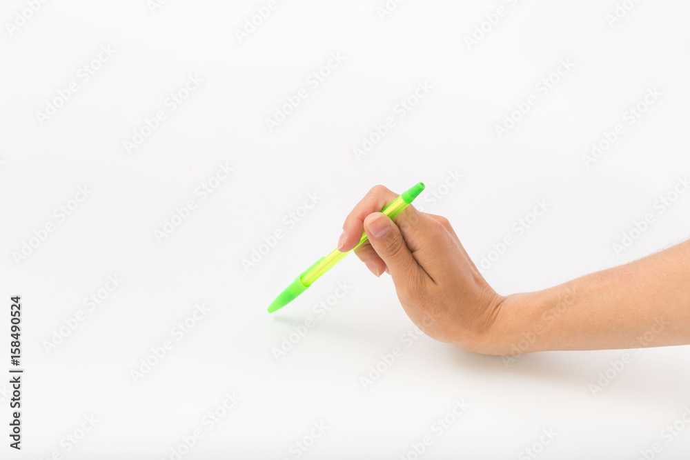 Female hands on a white background with a pen Female hands on a white background with a pen