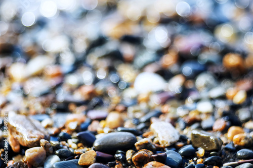 Pebble texture on the river bank