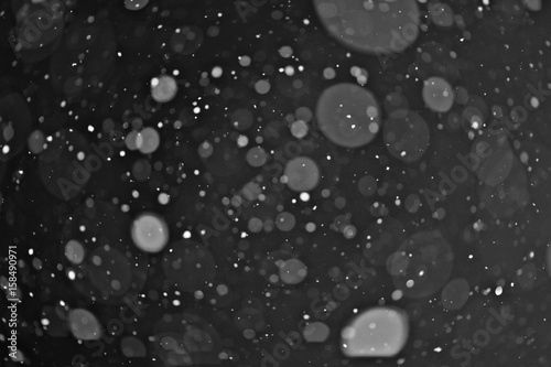 snow on a black background texture overlay bokeh highlights