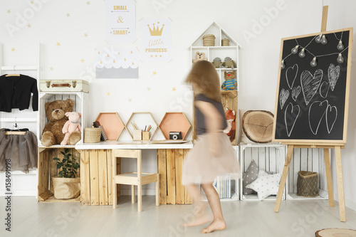 Child room with wooden  furniture