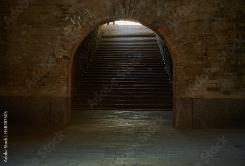 Arched passage with stairs in the fortress. Fragment of the fortification of the nineteenth century The Kiev Fortress photo