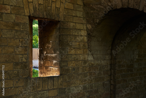 Photography Gun loophole in the brick wall of the fortification of the nineteenth century Th