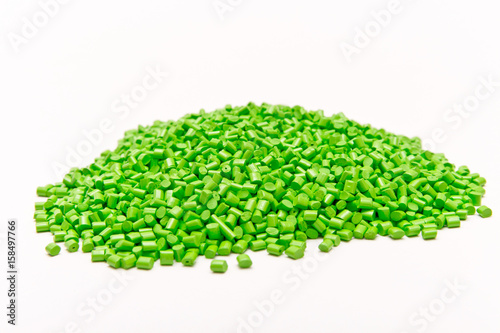 The plastic granules. Polymeric dye on a light table in the laboratory. photo