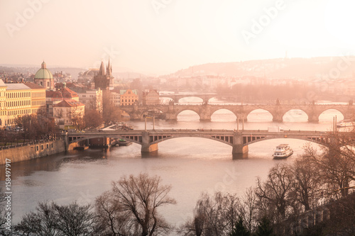 Prague bridges over Vltava river at sunset time, Czech Republic.