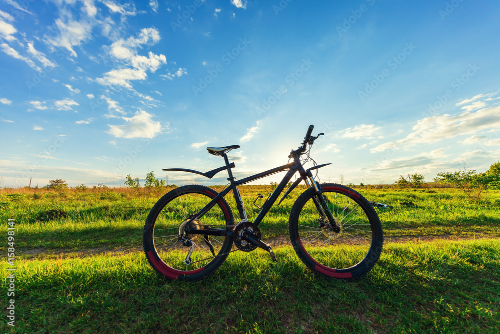 Mountain biking down hill descending fast on bicycle. View from bikers eyes. Mountain biking down hill descending fast on bicycle. View from bikers eyes.