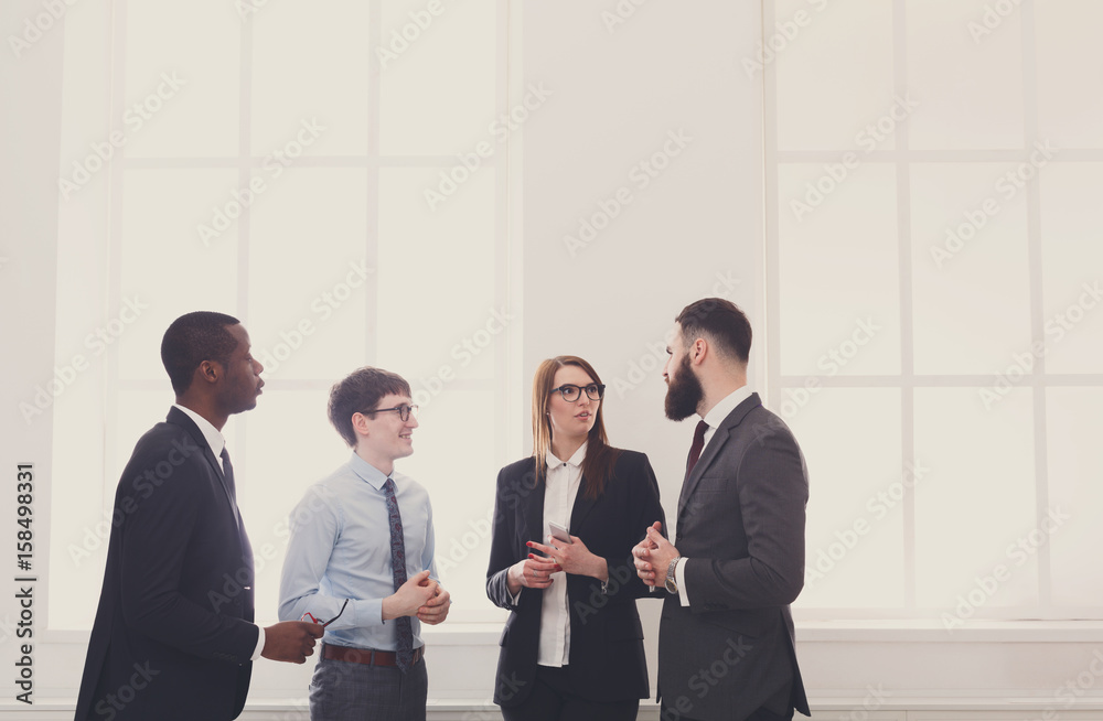 Corporate meeting in office, business people with copy space Corporate meeting in office, business people with copy space