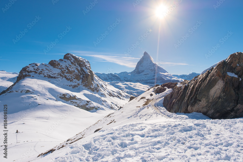 Sun behind Matterhorn, Zermatt, Switzerland