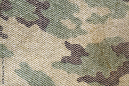 Dirty old camouflage uniform pattern.