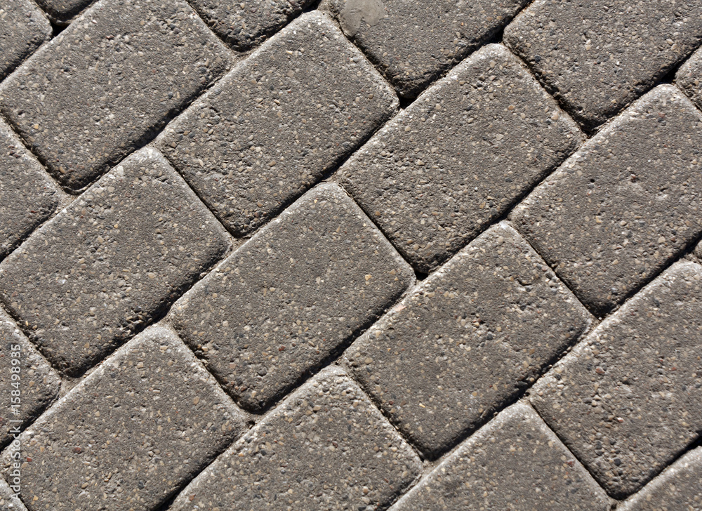 Gray color cobblestone pavement surface. Gray color cobblestone pavement surface.