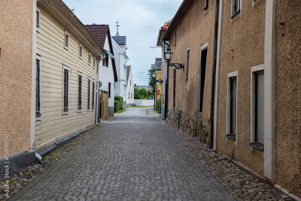 A cobblestone street in a small town in Sweden