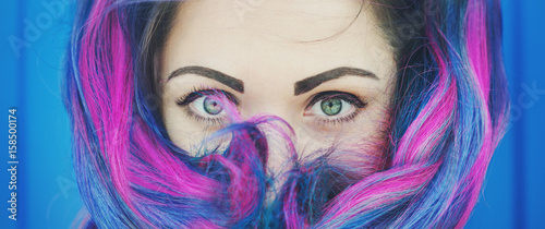 Portrait of beautiful fashion hipster woman with colorful hair
