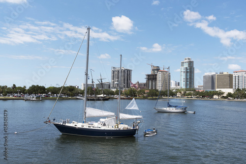 Yacht moored in the north yacht basin with a skyline view of St Petersburg Florida USA