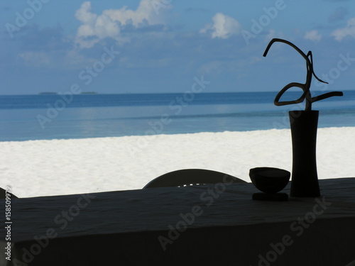 A hot day, quiet sea at Athuruga Maldives photo