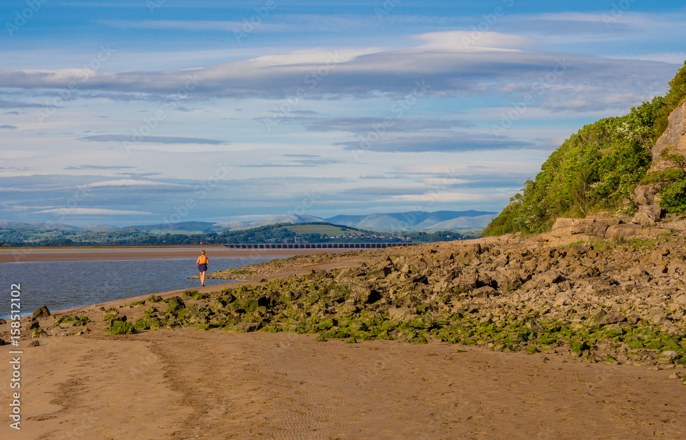 Rocky shore uncovered at low tide at Arnside, Lancashire, UK