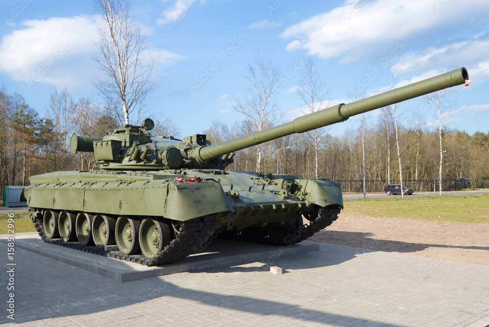 T-80 - the main battle tank of the Soviet Union close-up, sunny May day T-80 - the main battle tank of the Soviet Union close-up, sunny May day