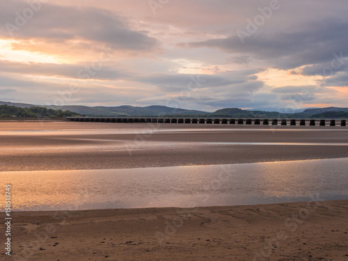 Beautiful early summer evening sunset over the beach and water at Arnside, Lancashire, UK