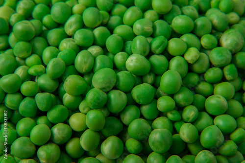 Green fresh peas background