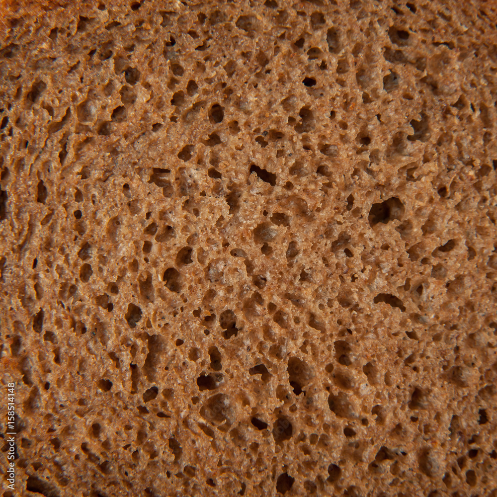 Texture of dark bread macro background