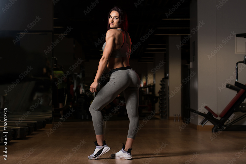 Woman In Gym Showing Her Well Trained Body