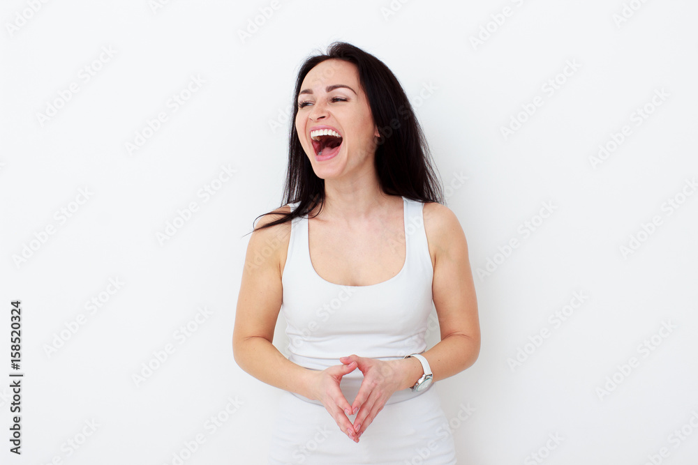 Happy woman Laughing. Closeup portrait woman smiling with perfect smile and white teeth Happy woman Laughing. Closeup portrait woman smiling with perfect smile and white teeth