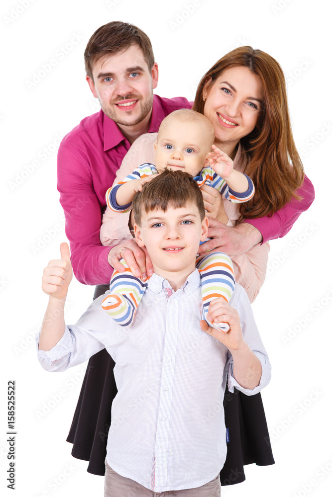 Portrait of a happy four-member family. Isolated on White Background. Father and Mother with two boys. Parents with Children. Focus on first boy