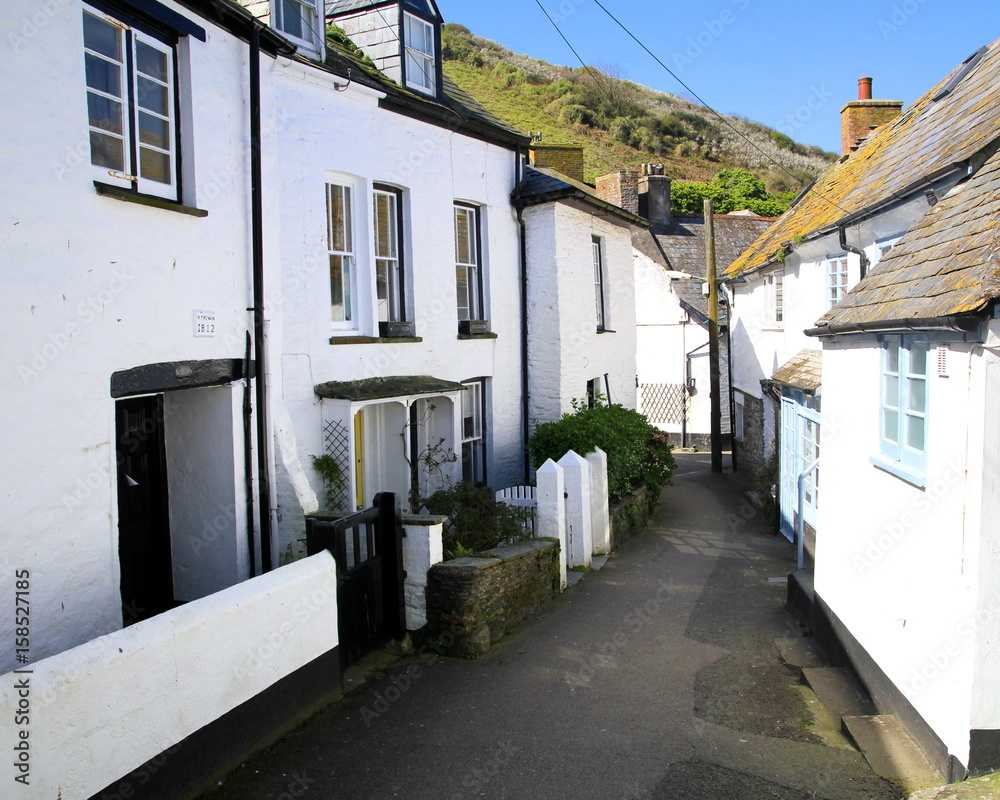 Quiet deserted narrow street in a picturesque fishing village in England