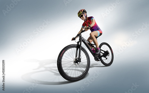 Fototapeta Naklejka Na Ścianę i Meble -  Sport. Athlete cyclists in silhouettes on white background. Isolated