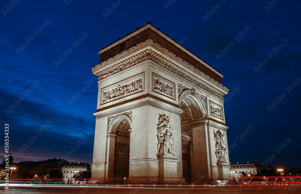 The Triumphal Arch at night, Paris, France.