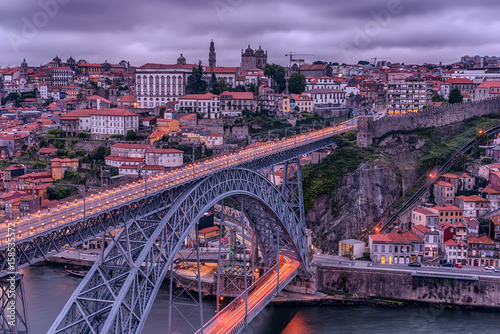 Porto, Portugal: the Dom Luis I Bridge and the old town at sunset 