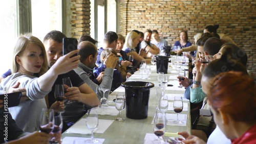 Happy friends having fun - Young people enjoying harvest time together at farmhouse vineyard countryside