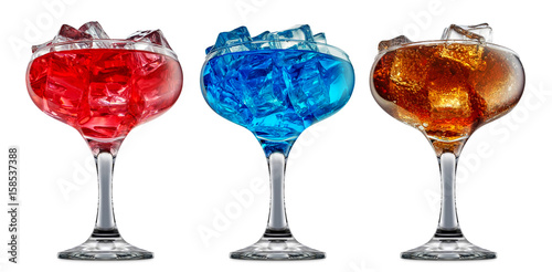 fresh fruit alcohol cocktail or mocktail in margarita glass with blue red and orange beverage isolated on white background