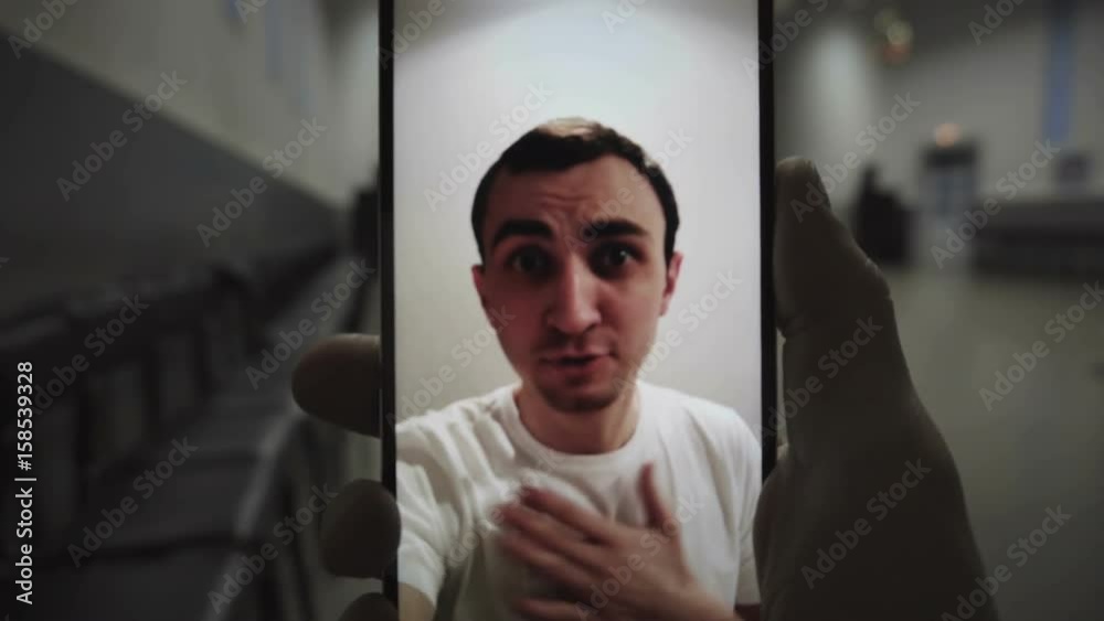Using video chatting with man on smart phone Using video chatting with man on smart phone