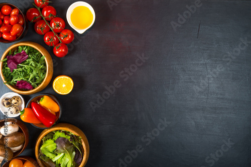 Vegetables for dietary catering on black background