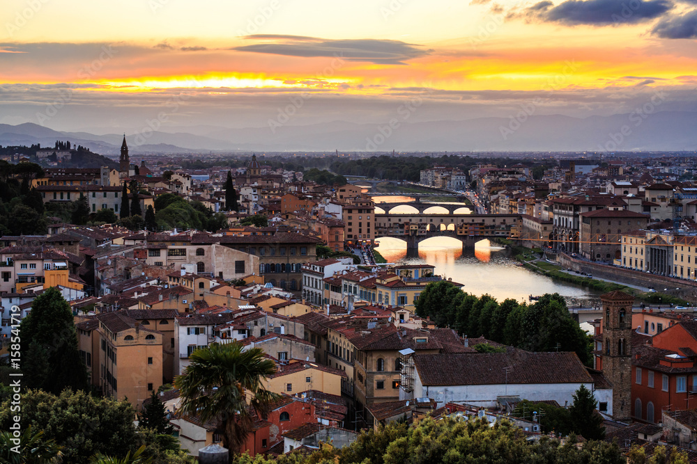View of Florence at sunset with the Ponte Vecchio bridge, Italy