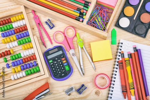 School supplies on wooden background