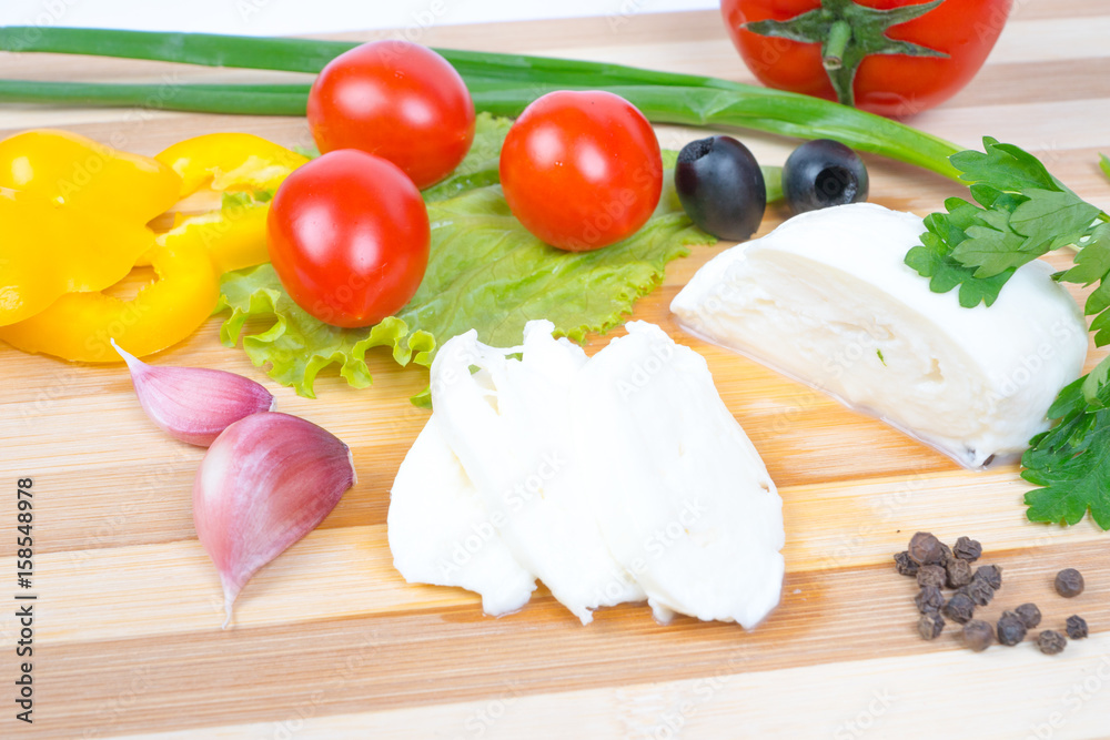 sliced mozzarella with vegetables and spices sliced mozzarella with vegetables and spices