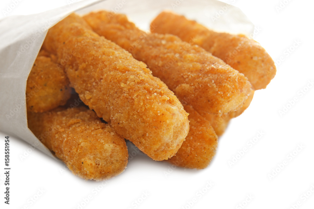 Delicious fried cheese sticks on white background