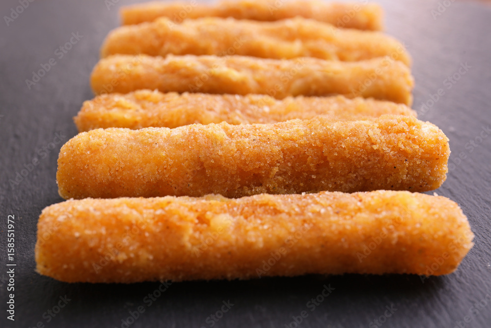 Delicious fried cheese sticks, closeup Delicious fried cheese sticks, closeup