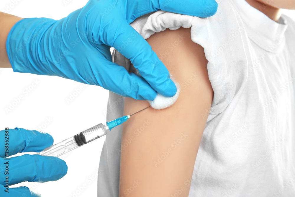 Doctor vaccinating child on white background, closeup Doctor vaccinating child on white background, closeup