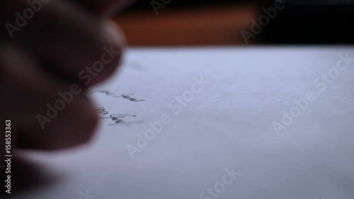 Criminal practicing forging someone elses signature on paper